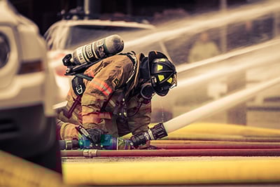 Fireman with hose